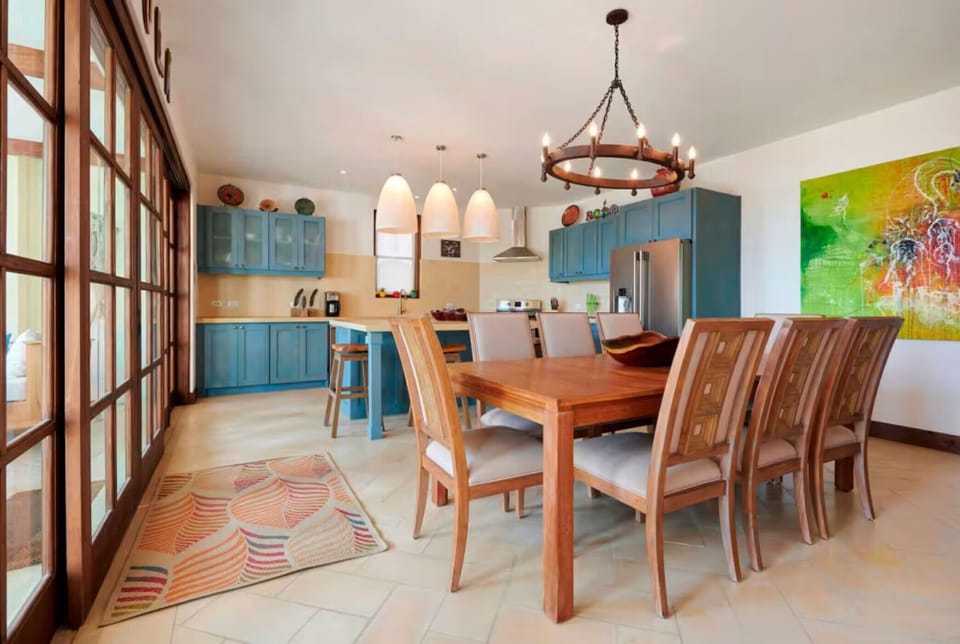 Bright kitchen and dining area - spacious kitchen island and dining for up to 8 people.