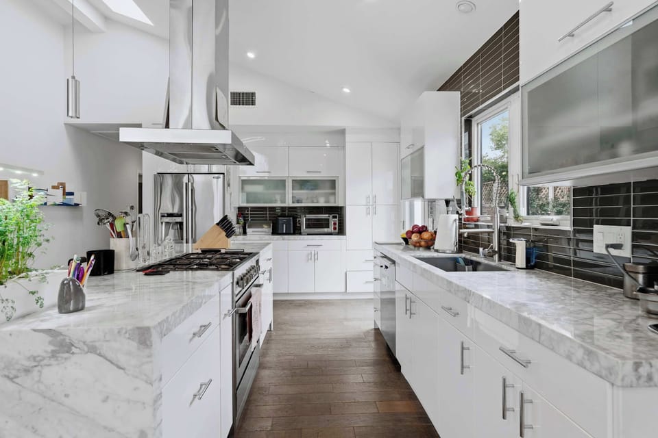 Chef's Kitchen | Marble Island & Stainless Appliances