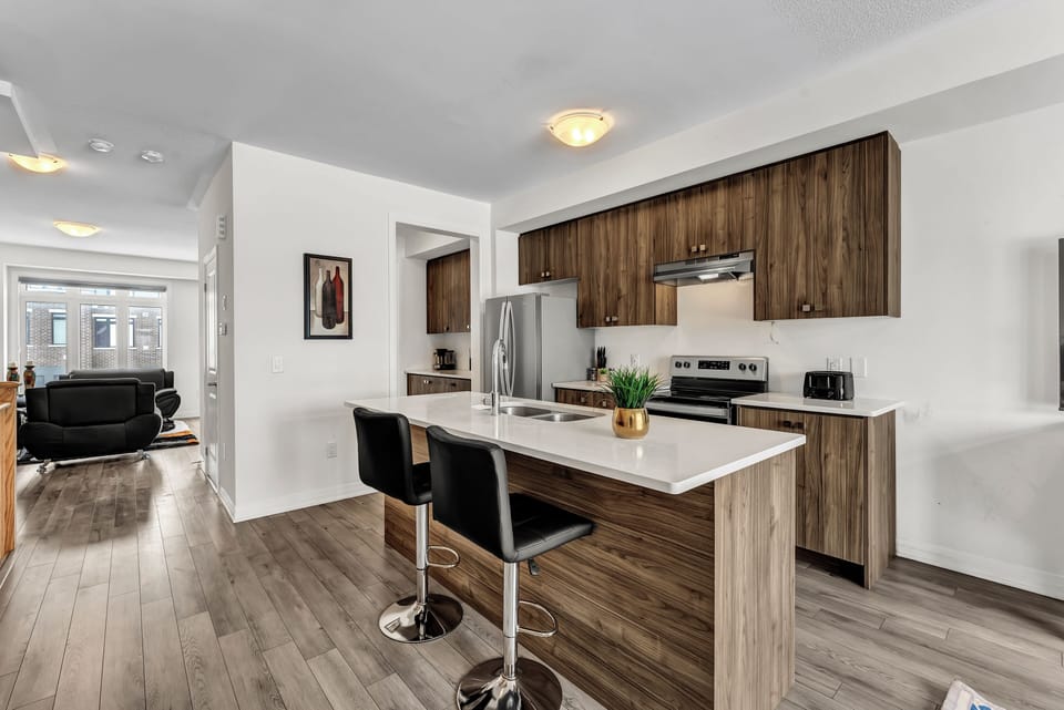 View of the breakfast bar looking toward the living space