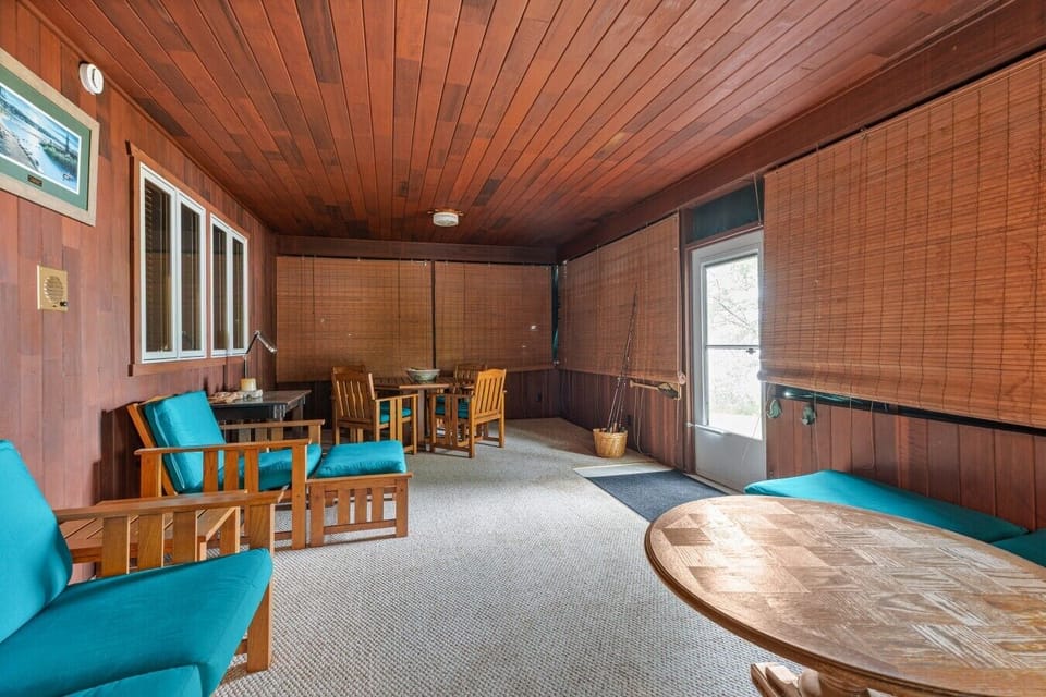 Main House Sunroom | Lounge Seating | Wood Paneling