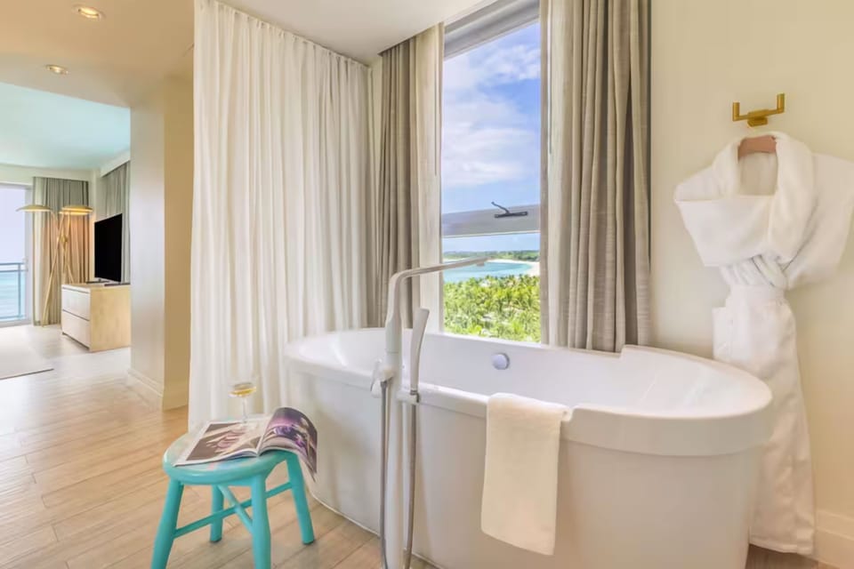 Soak by the window and savor a serene, private escape.