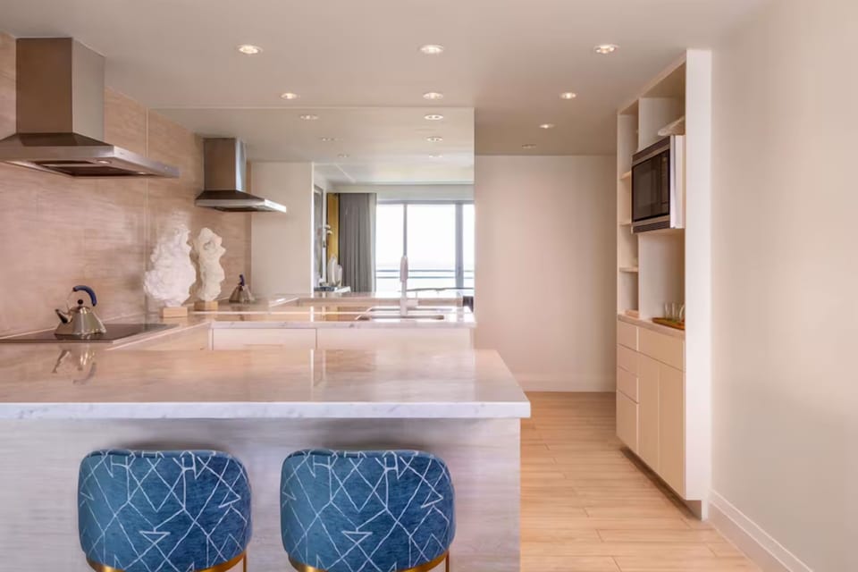Cook with ease in the modern kitchen with generous prep space.