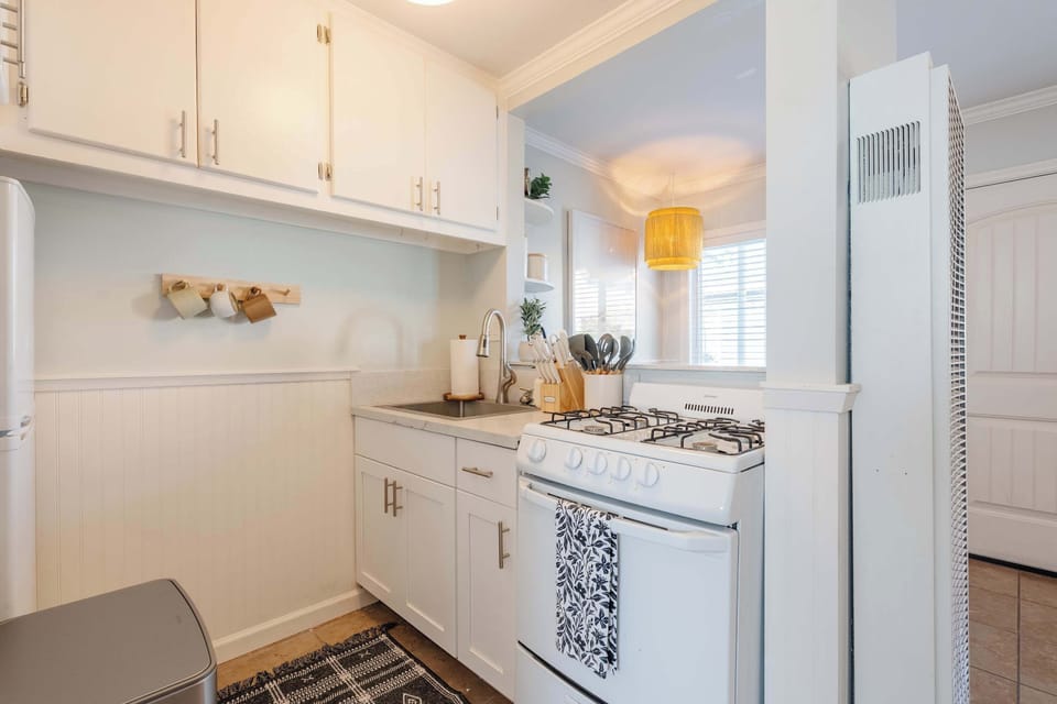 Clean, functional kitchen with ample counter space and storage.