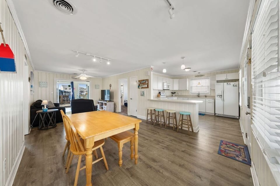 Step inside and see a vintage beach house complete with open floor concept.