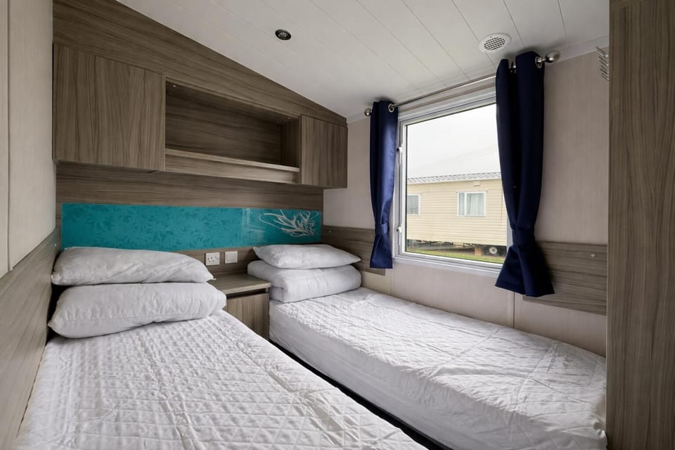 For those who love caravan holidays, Steeple Bay Holiday Park Essex provides comfortable bedrooms in a caravan, making it an ideal spot for a family holiday near the charming town of Maldon.