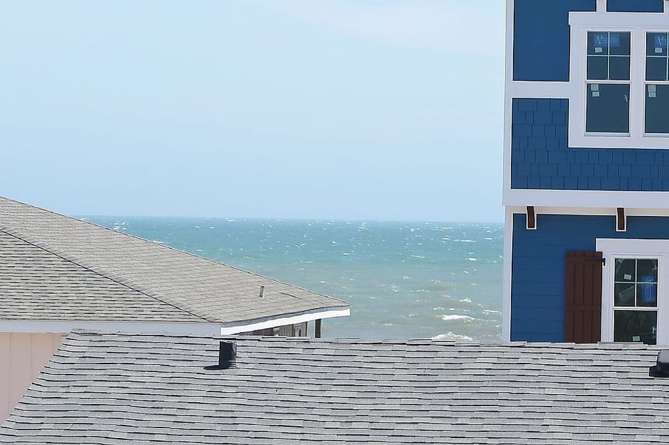VIEW FROM TOP FLOOR DECK TOWARDS OCEAN