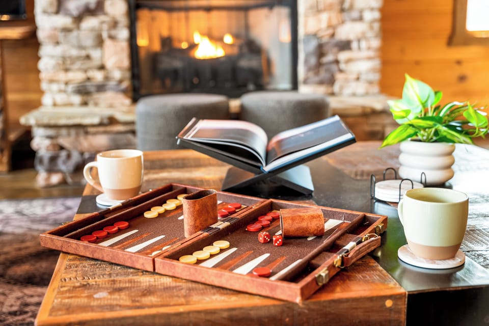 Sip coffee and play board games in the rustic-chic fireside cabin lounge