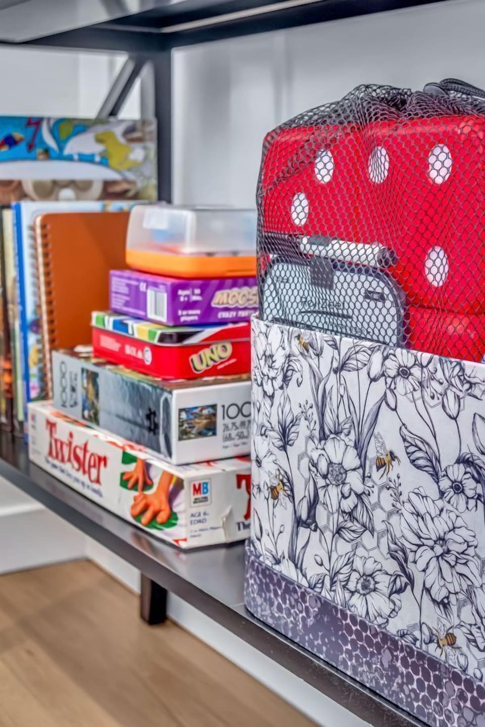 Sunrise cottage - offers plenty of indoor fun with a dedicated shelf stocked with board games, puzzles, and family activities—ideal for snowy nights in.
