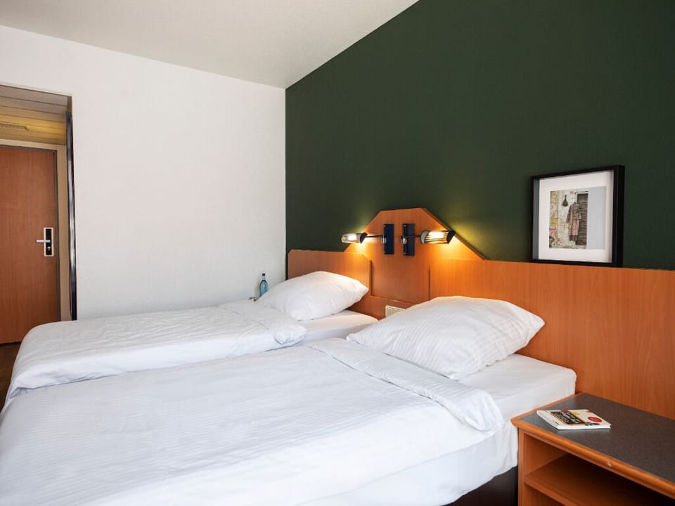 Stretch out after a long day in simple, restful comfort.