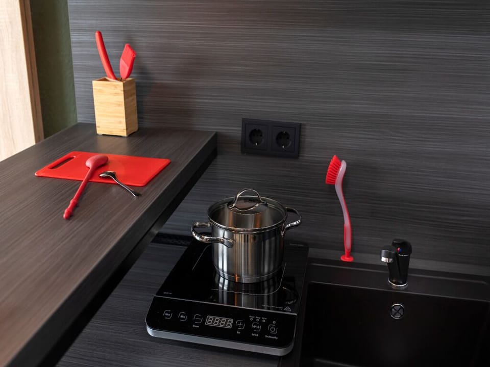 Prepare quick bites with a handy sink and prep space.