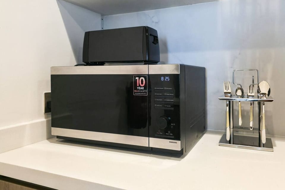 Enjoy the convenience of modern appliances and ample space to cook and dine