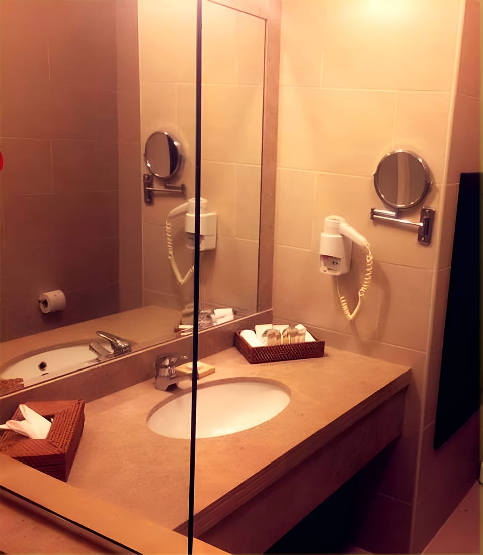 Freshen up easily with a convenient vanity and essentials.