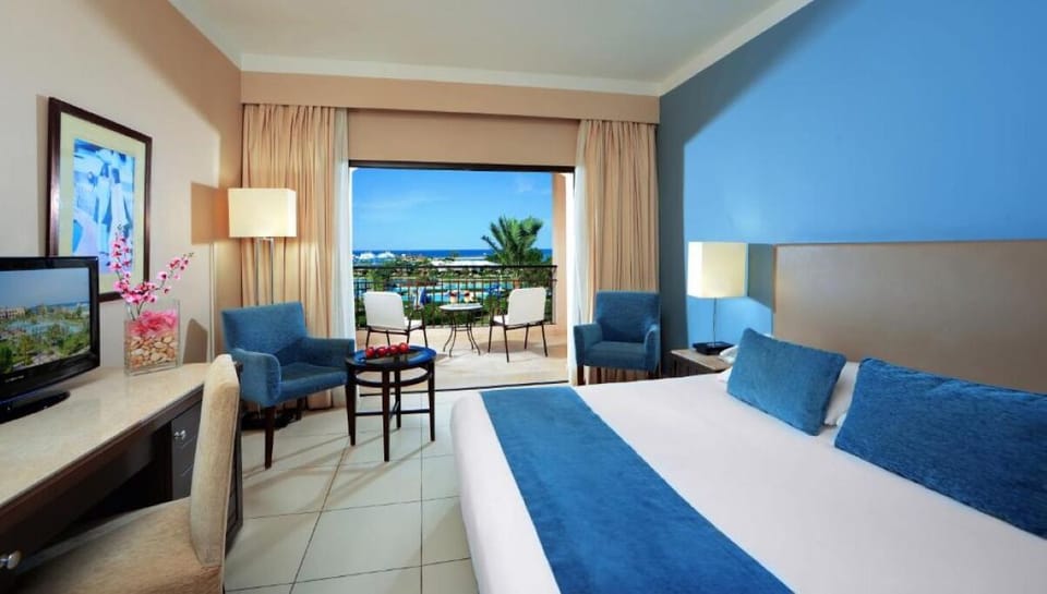 Drift off in twin beds with a breezy sea-view terrace.