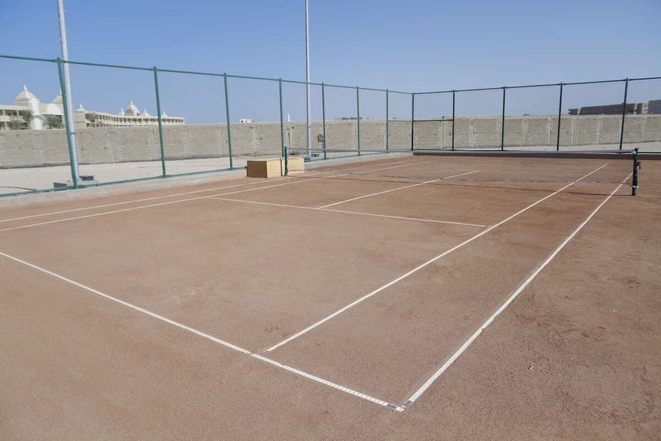 Serve up fun on the outdoor court under open skies.