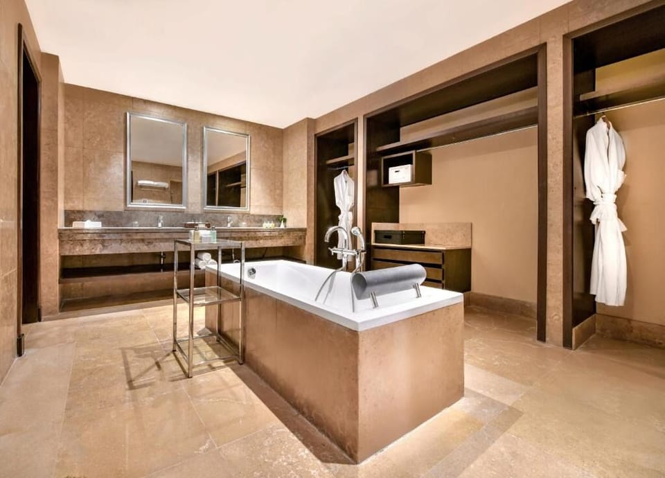Indulge in a spa-like soak in the oversized bathtub.