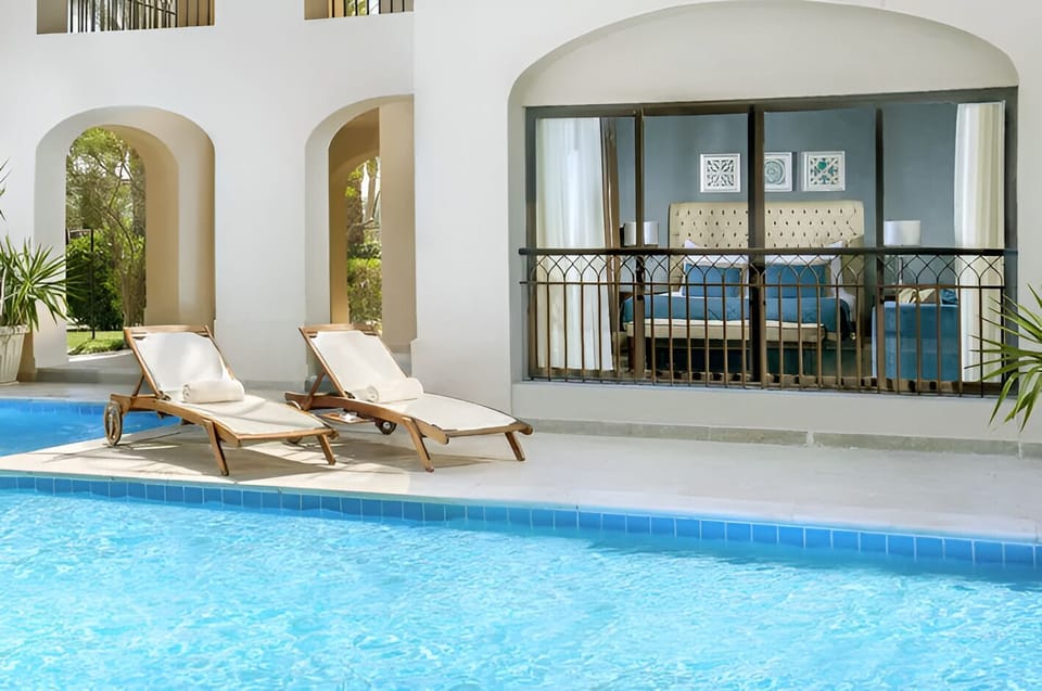 Dive into sparkling pool time just steps from your room.