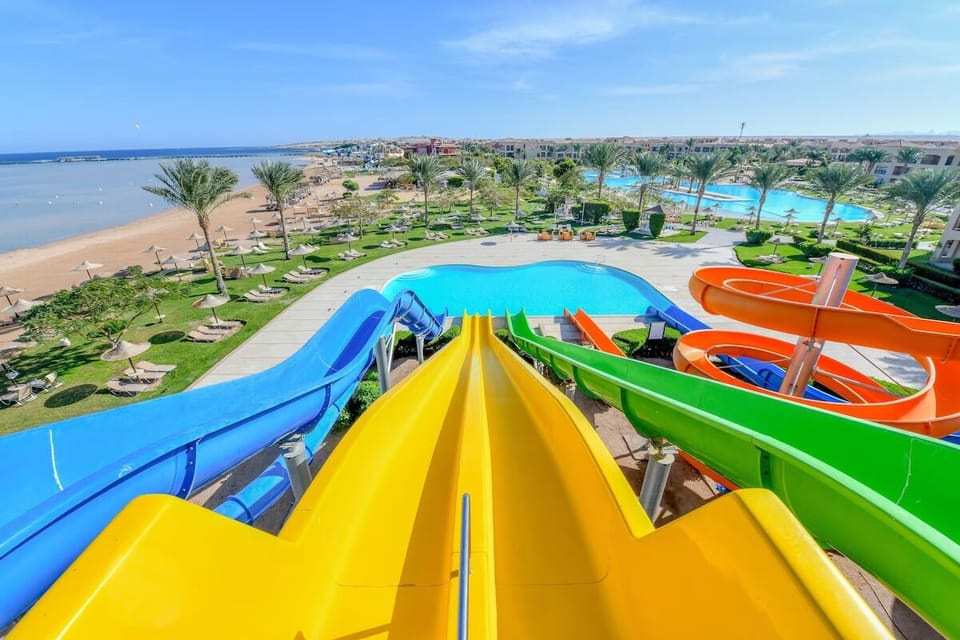 Feel the rush as slides soar above the beachfront pools.