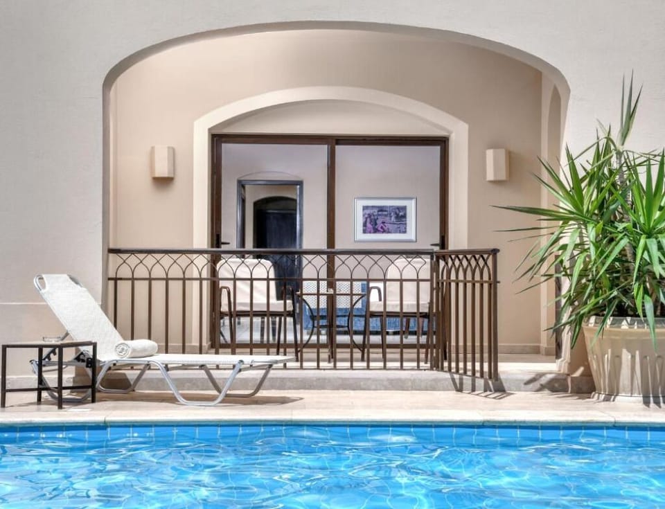 Soak up sunshine poolside with loungers just steps away.