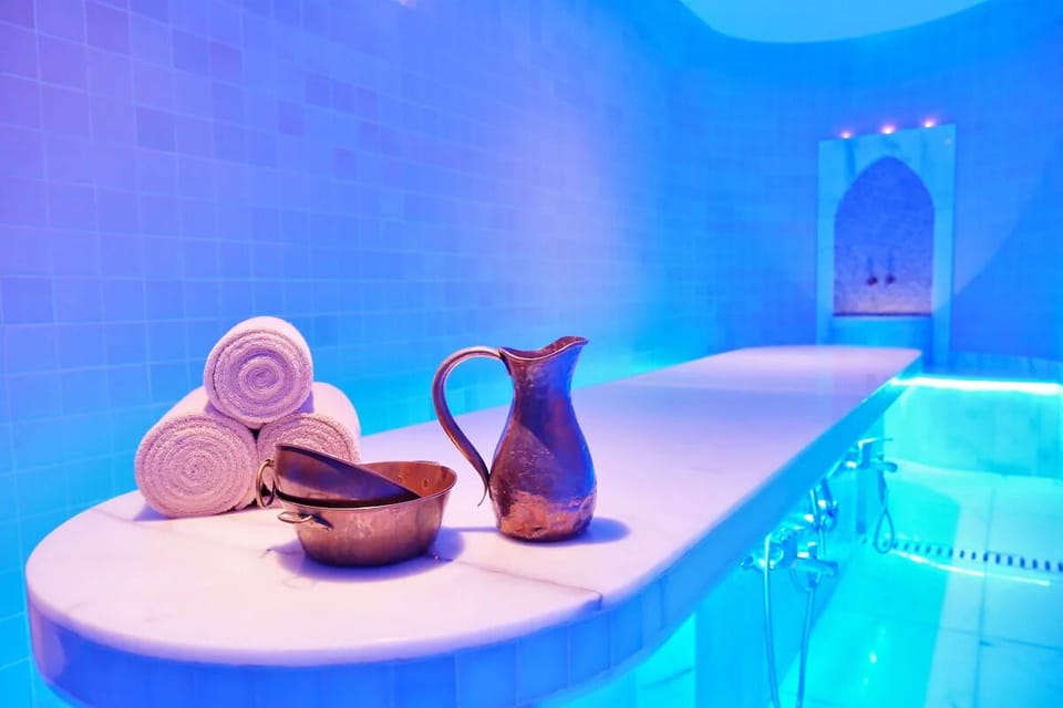Soak in tranquil blue-lit steam rooms for total relaxation.