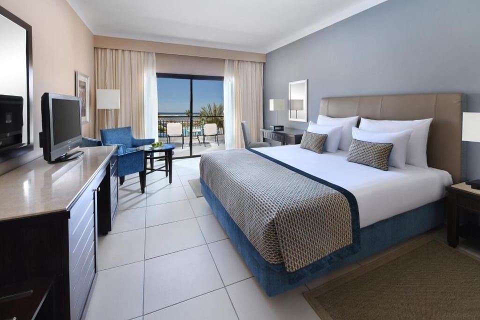 Return to a serene bedroom retreat with calming resort tones.