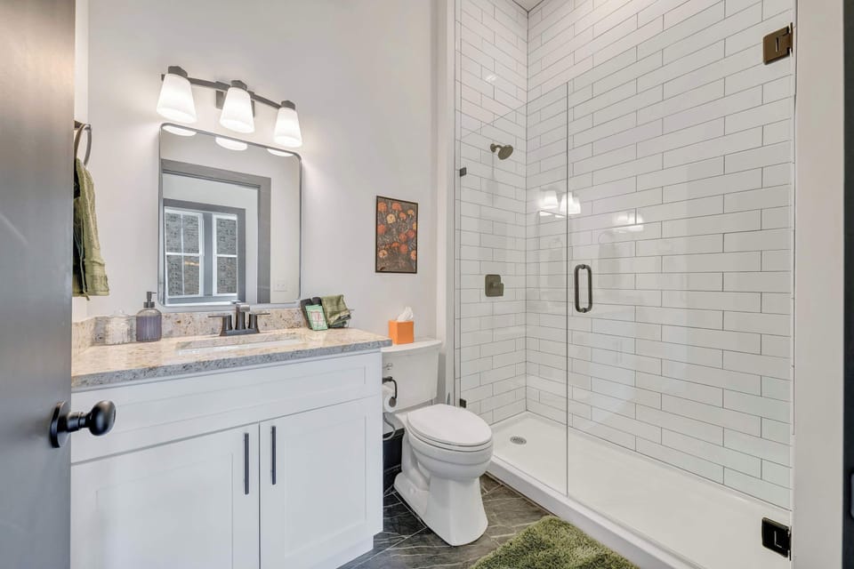Master ensuite bathroom includes a full size walk in shower, basic toiletries (make up wipes, shampoo, conditioner, and body wash included). 