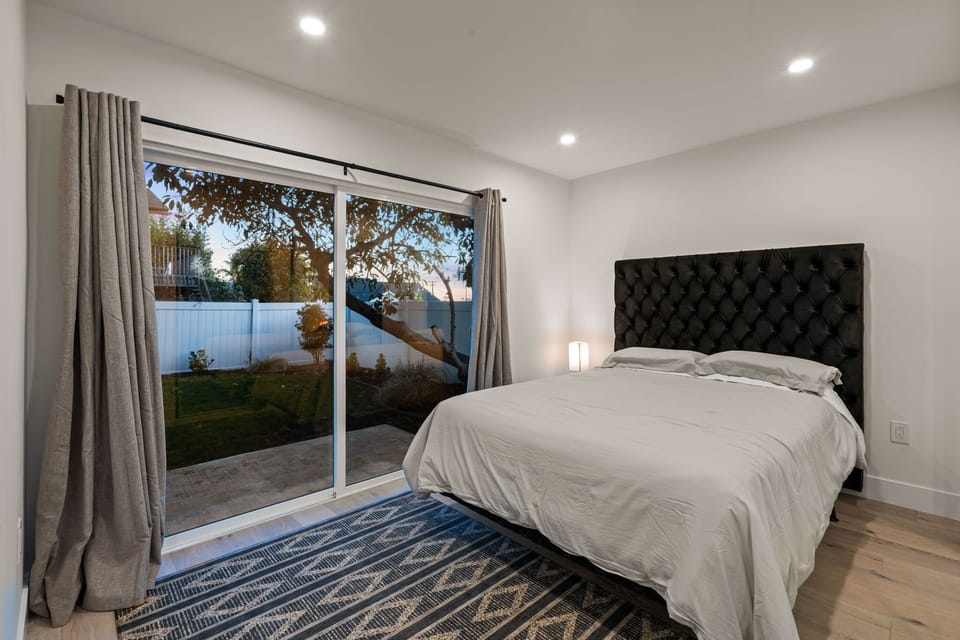 Comfortable bedroom with backyard access