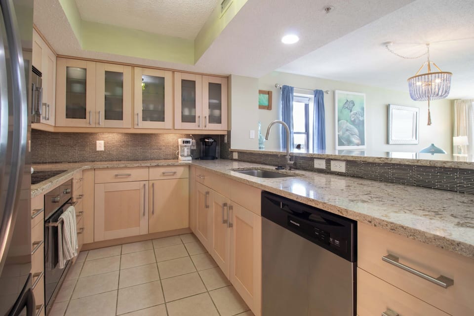 Your spacious kitchen features granite counters, stainless appliances, and everything needed to prepare your favorite meals.