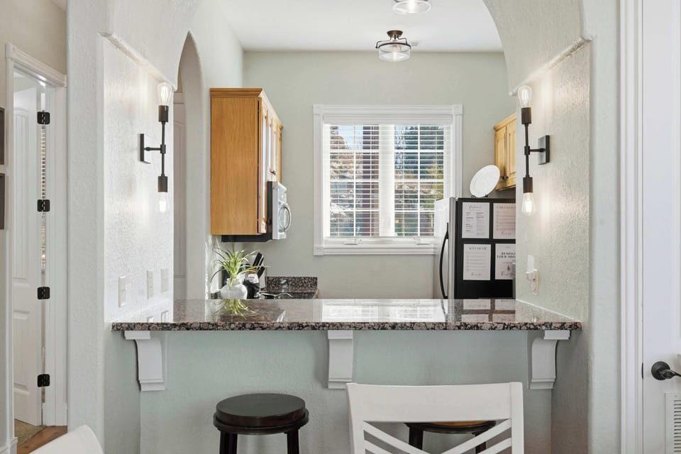 The inviting kitchen is well equipped for an unforgettable getaway​