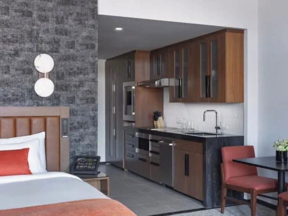 Cook and sip morning coffee in your sleek kitchenette.