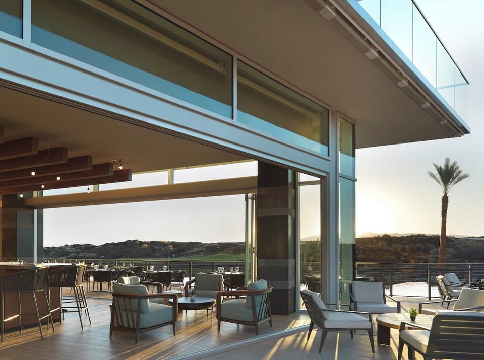 Sip sunset cocktails on the expansive terrace lounge.