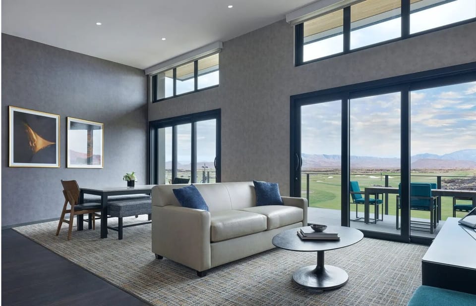 Unwind on the sofa as sunset views pour in.