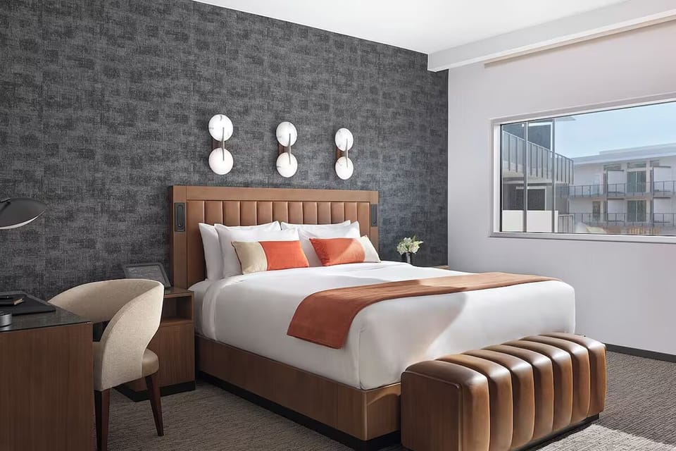 Sink into crisp linens and recharge in this calming bedroom.