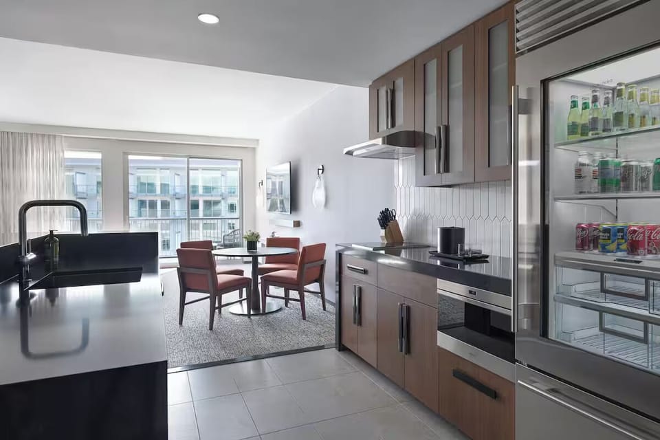 Cook and gather effortlessly in the sleek, fully equipped kitchen.