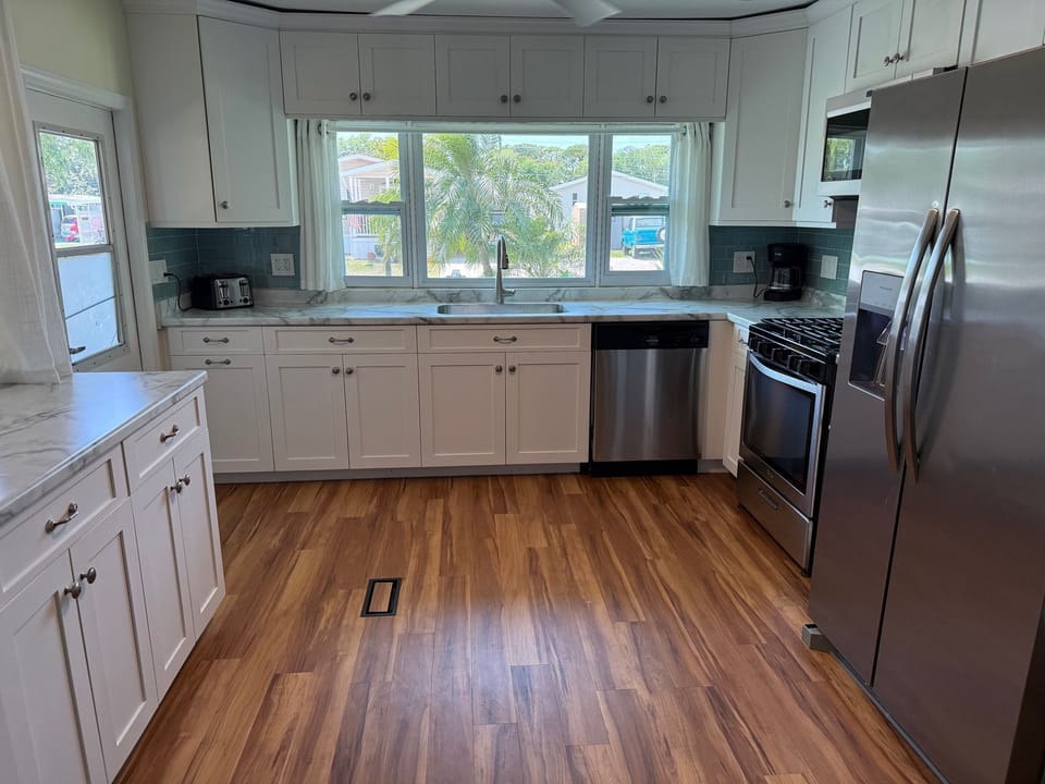  dishwasher, icemaker, air fryer, coffee maker, blender, utensils, pots and pans