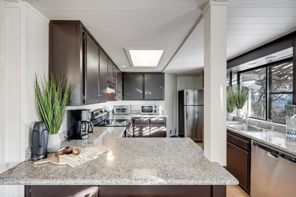 Modern kitchen with sleek finishes and natural light