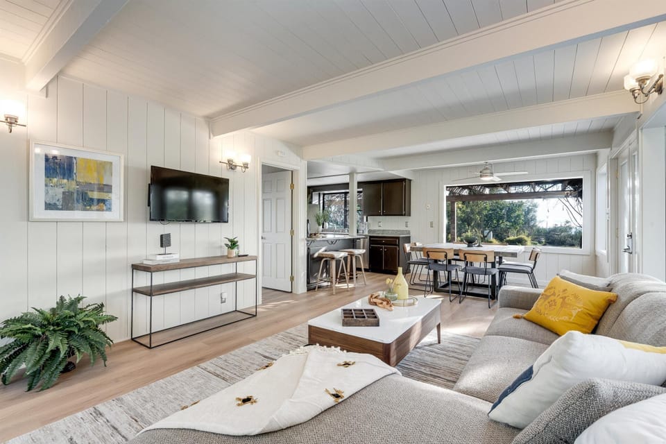 Spacious living room with cozy seating and natural light