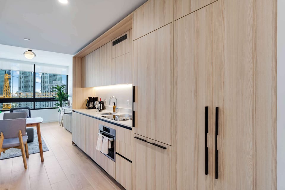 Fully equipped for long-term stays or weekend getaways. Cook, dine, and unwind with the best views in the city