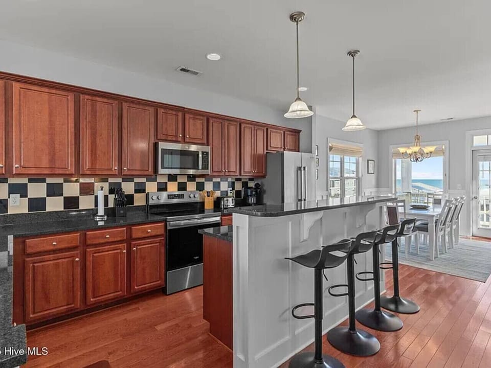 Kitchen with ocean and waterway view