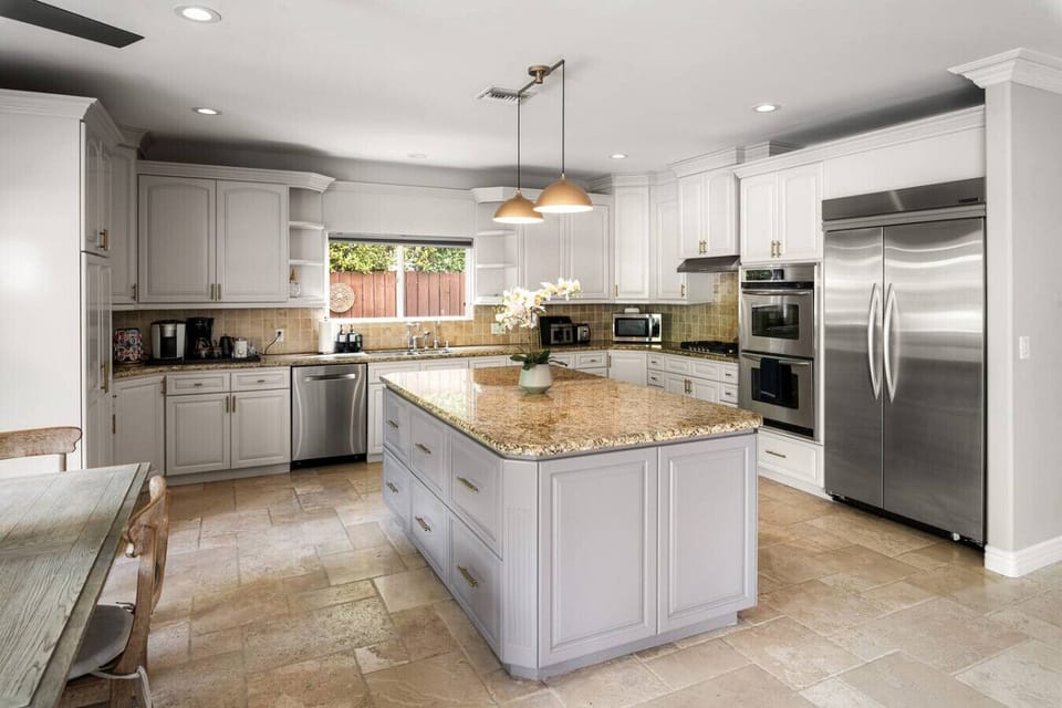 A chef’s dream kitchen just steps away from cozy sitting areas and a relaxing lounge.