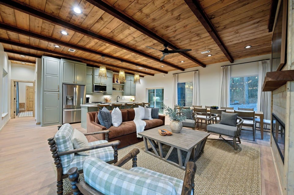 Open living area — cozy seating, fireplace, and seamless flow for group stays.