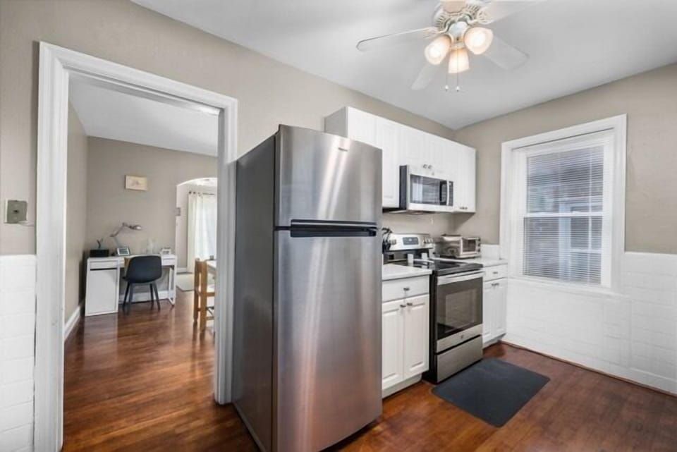 Modern kitchen featuring stainless steel appliances and clean, contemporary finishes