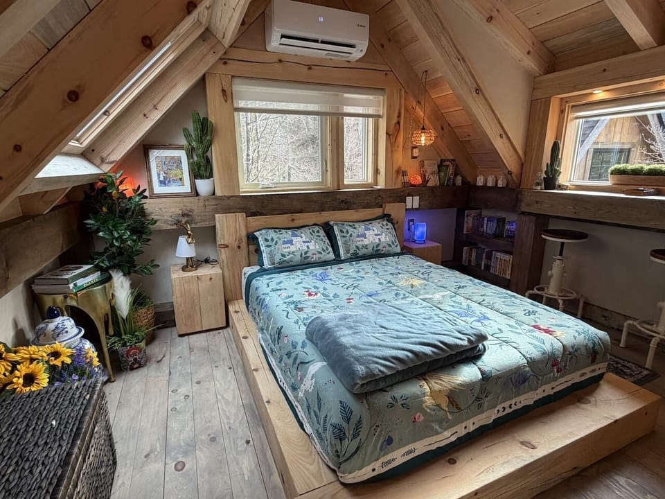 Queen size bed in loft | Dedicated work area | Chairs