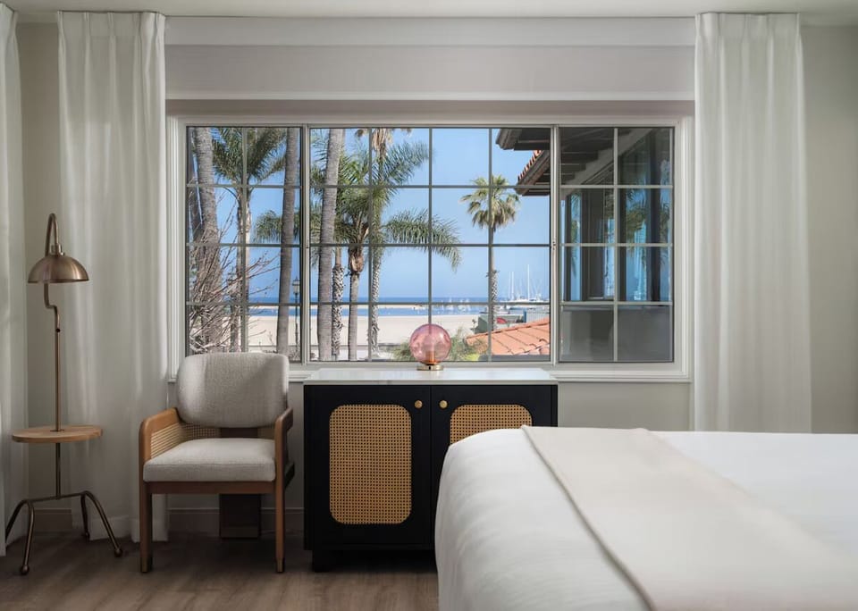 Sip morning coffee beside the window with coastal breezes.