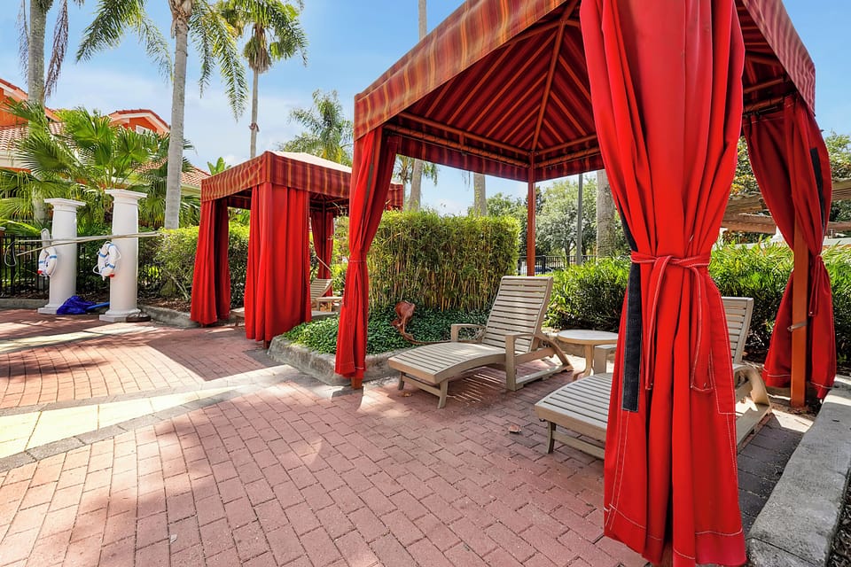 Escape the crowds in your own exclusive sanctuary, featuring plush, weather-resistant loungers at the resort pool 