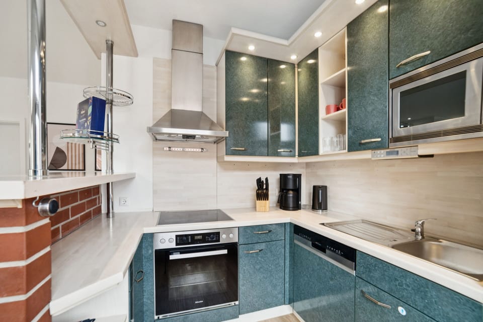 Kitchen equipment with oven, dishwasher and microwave