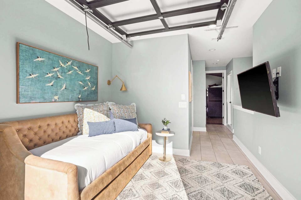 Bonus Area with Smart TV, Couch + Outdoor Balcony with Seating