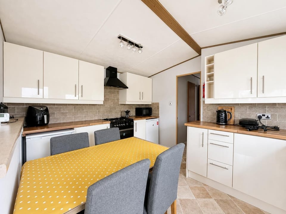 Enjoy meals together in the cosy dining room with an open-plan dining area during your stay at Dovercourt Holiday Park.