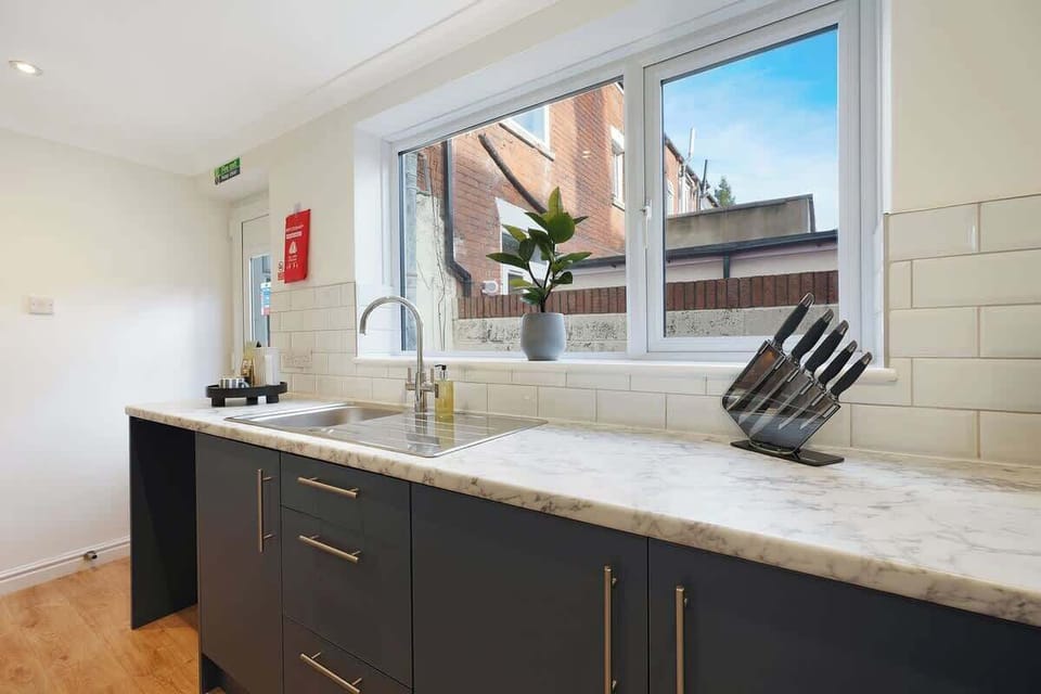 Designed for easy self-catering, the kitchen includes a gas hob, oven, microwave, and fridge/freezer. Stocked with cookware, plates, and utensils, it's perfect for both quick meals and longer stays.