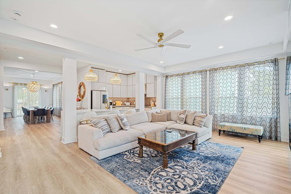 Sunlight fills the living room, creating the perfect place to relax.