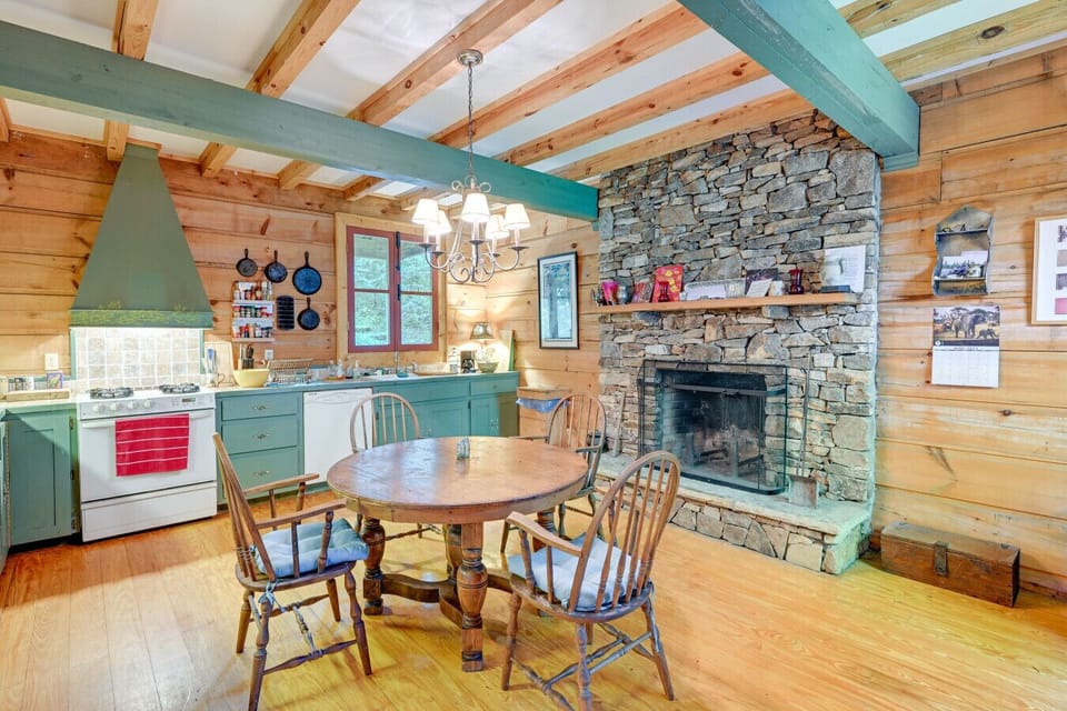 Kitchen | Rustic Cabinets, Stone Hearth & Exposed Beams